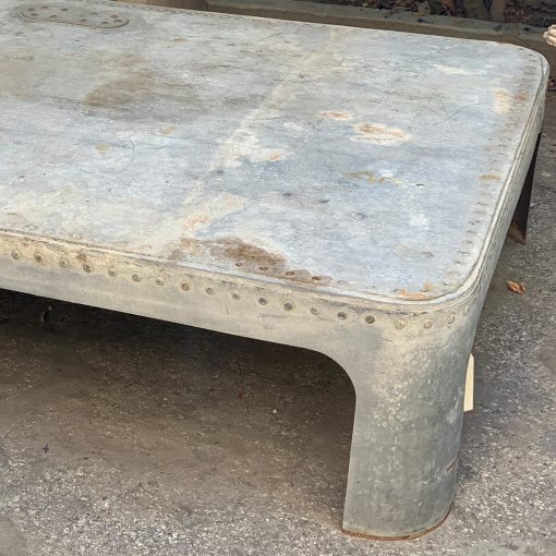 Antique galvanized metal coffee table, top right angle