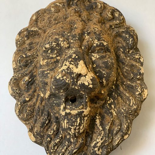 Antique lion head garden water feature