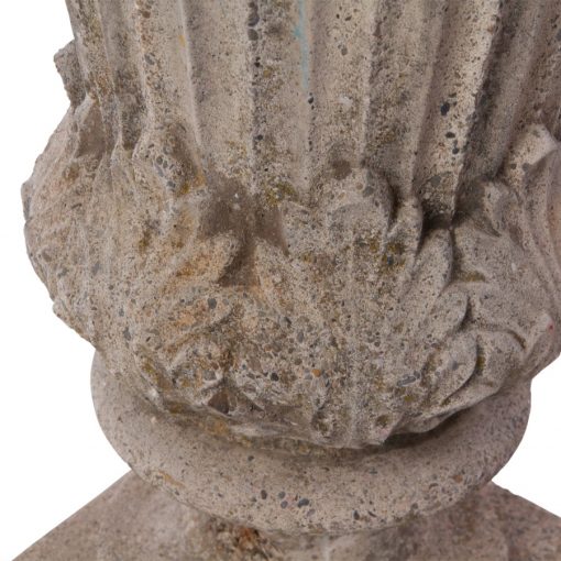 Closeup of concrete tulip motif of concrete urn