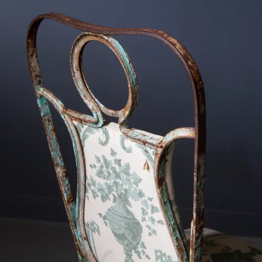 Rear angled closeup of vintage French dining chair at Inner Gardens