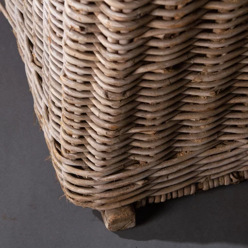 Closeup of bottom of vintage French wicker basket used for grape gathering
